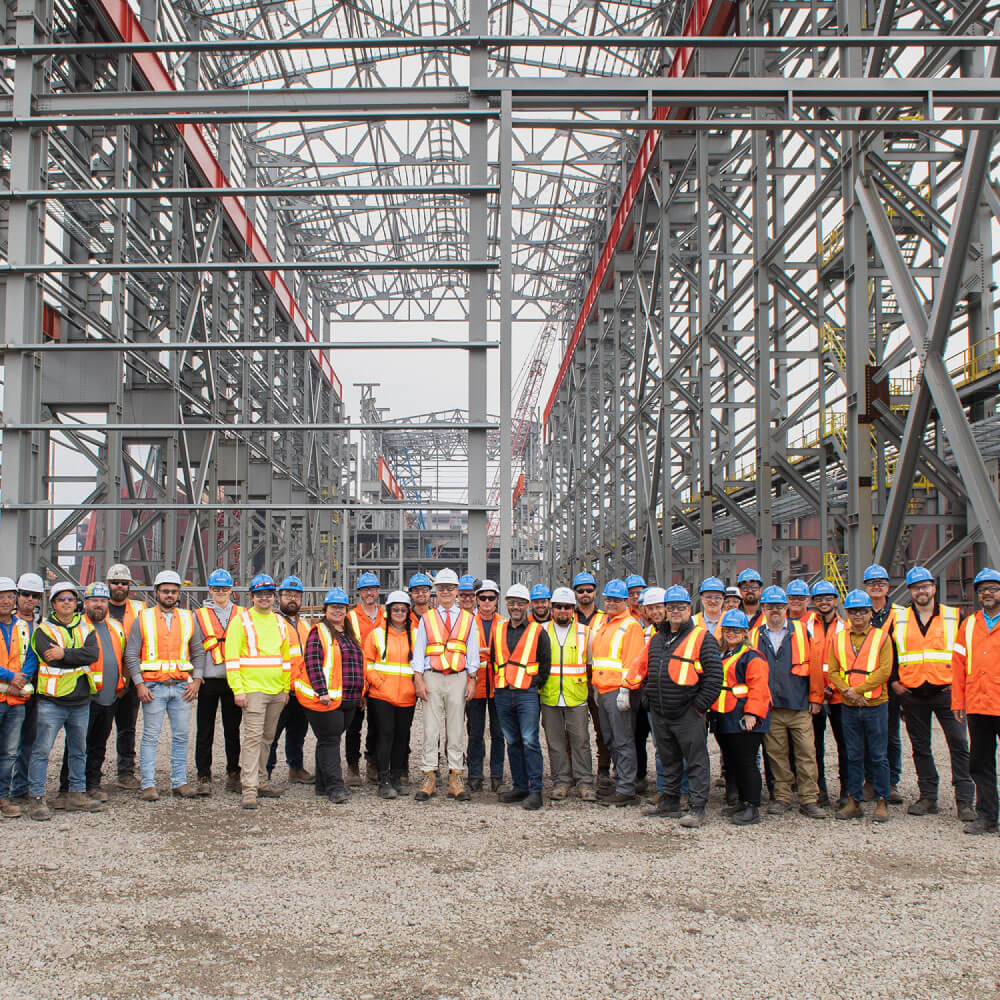 Algoma Steel workers in front of the Electric Arc Furnace under construction