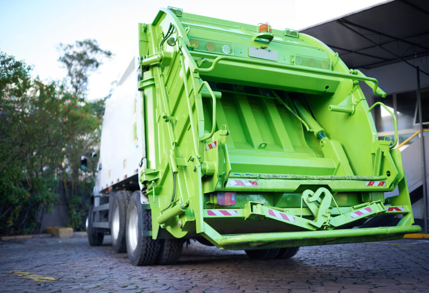 The back of a garbage truck.
