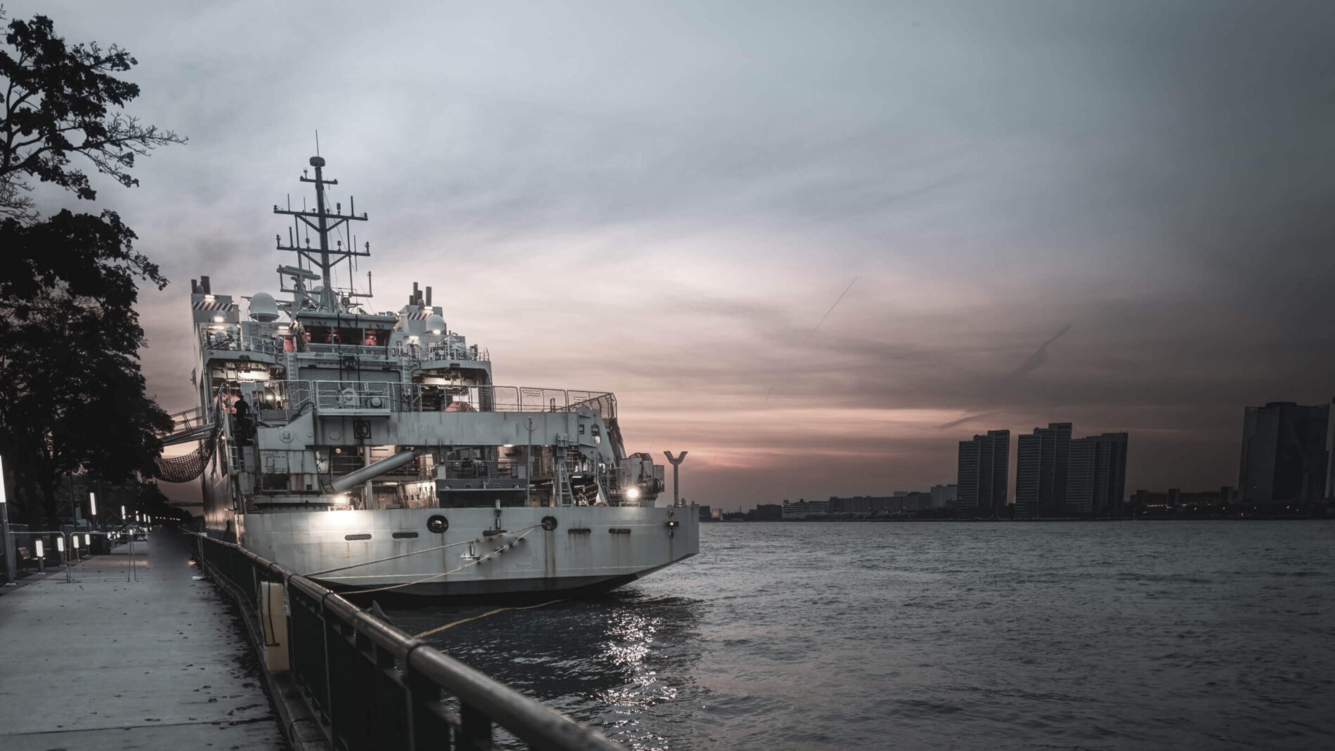 Military war ship docked at port