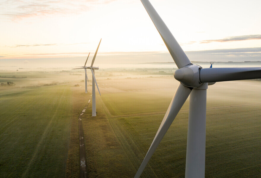 Wind towers in a field